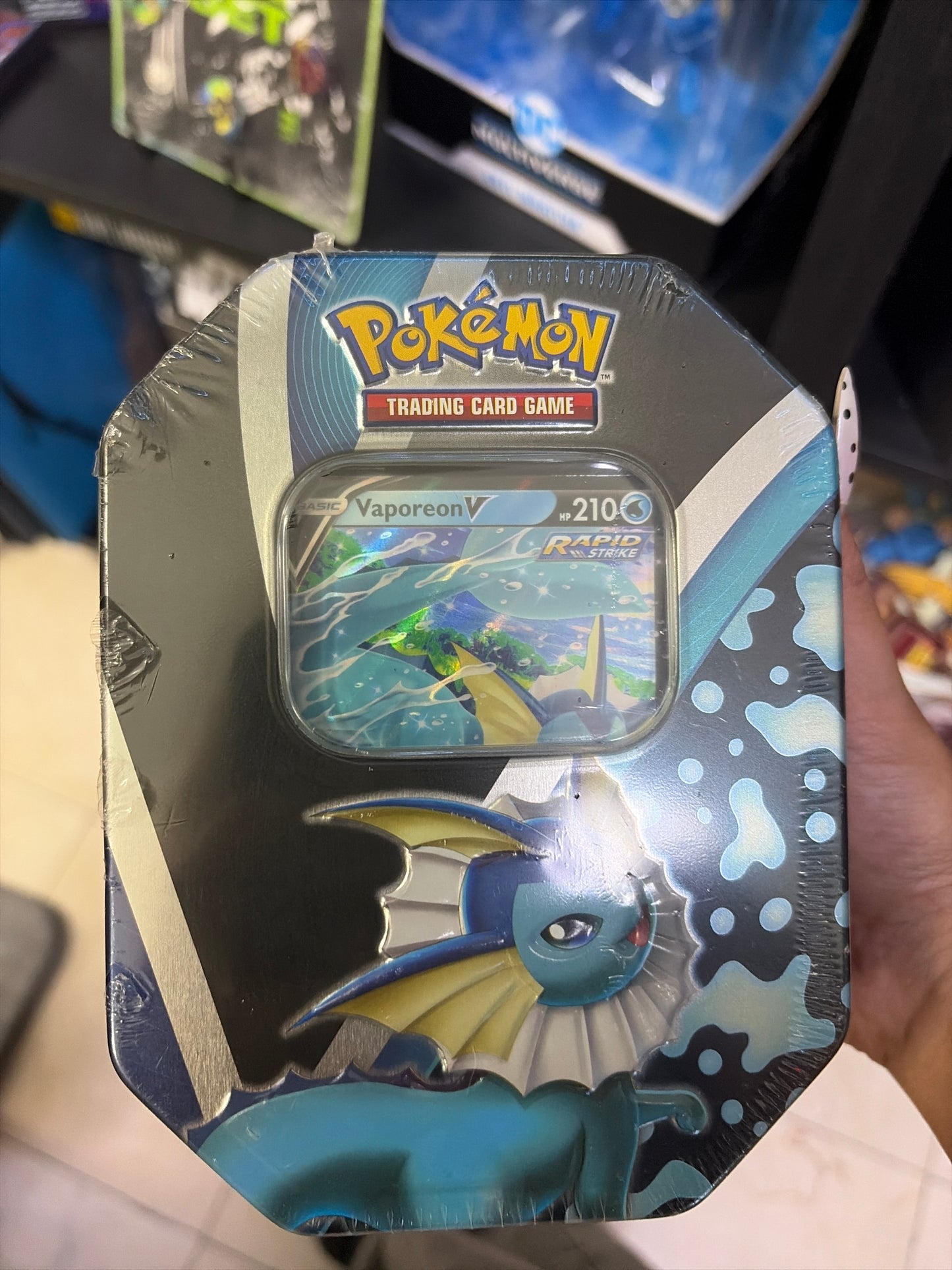 Pokemon TCG Vaporeon tin